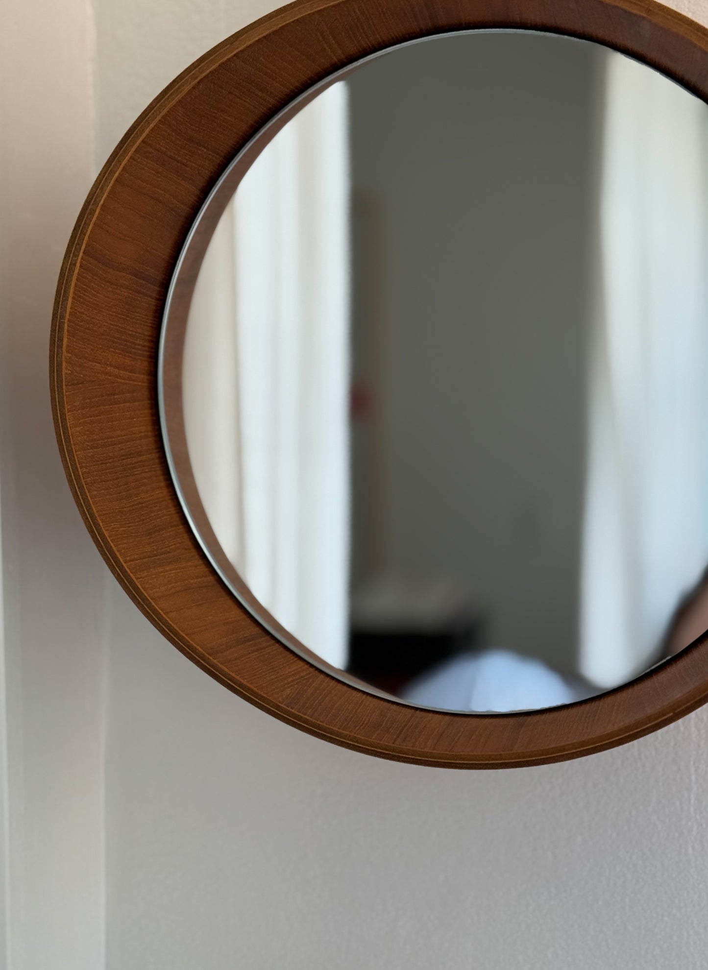 Small teak mirror