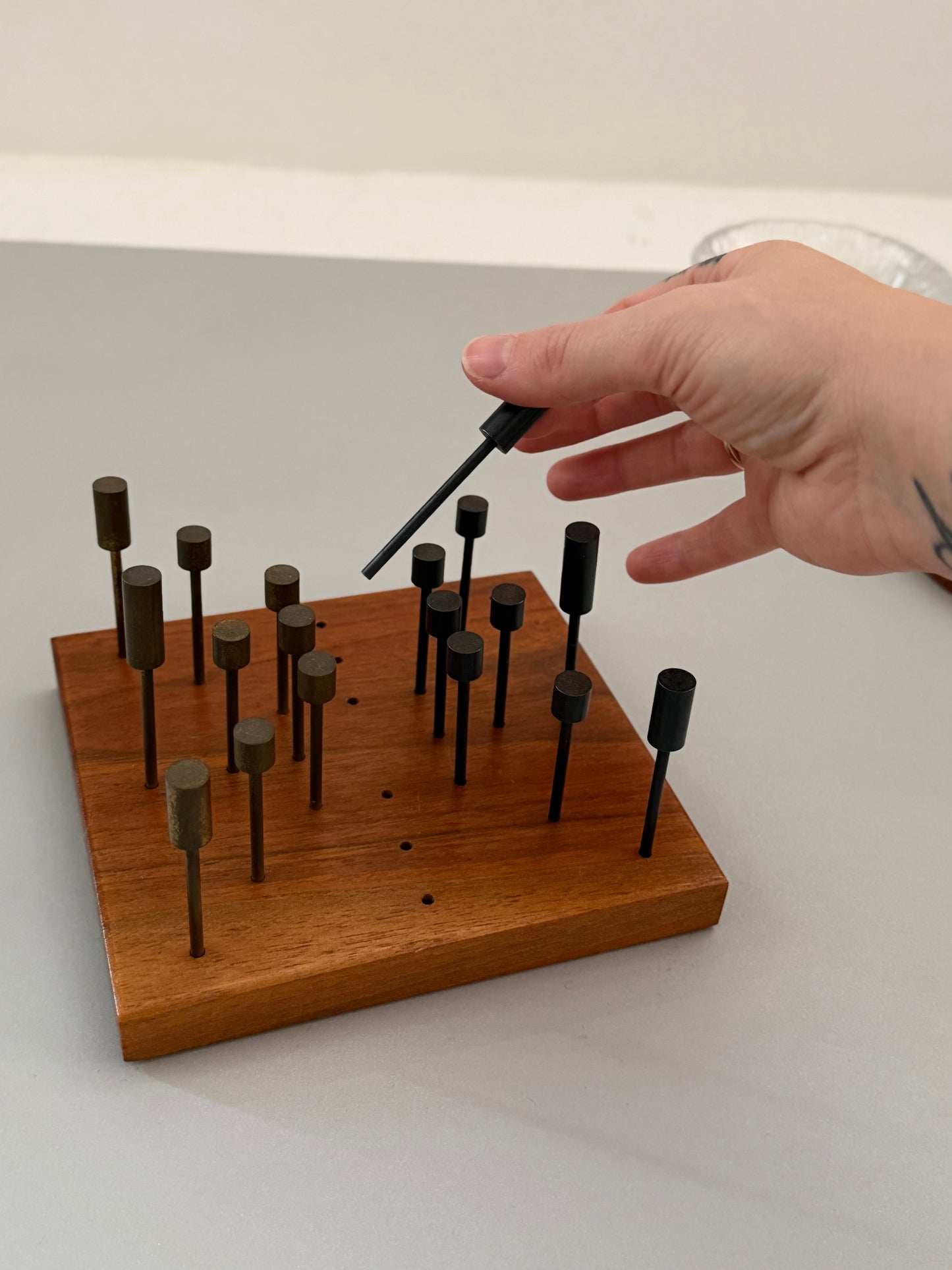 Teak and brass solitaire game