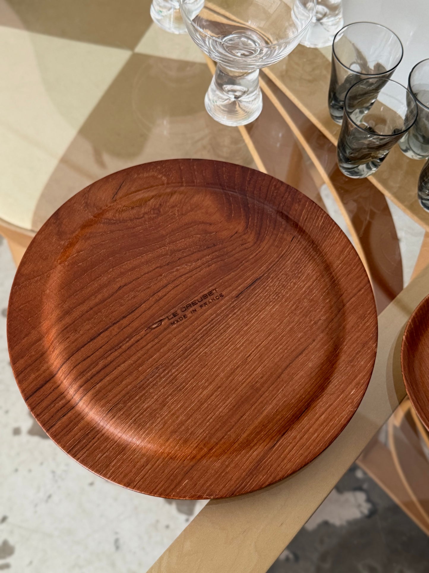 Medium round teak tray by Le Creuset