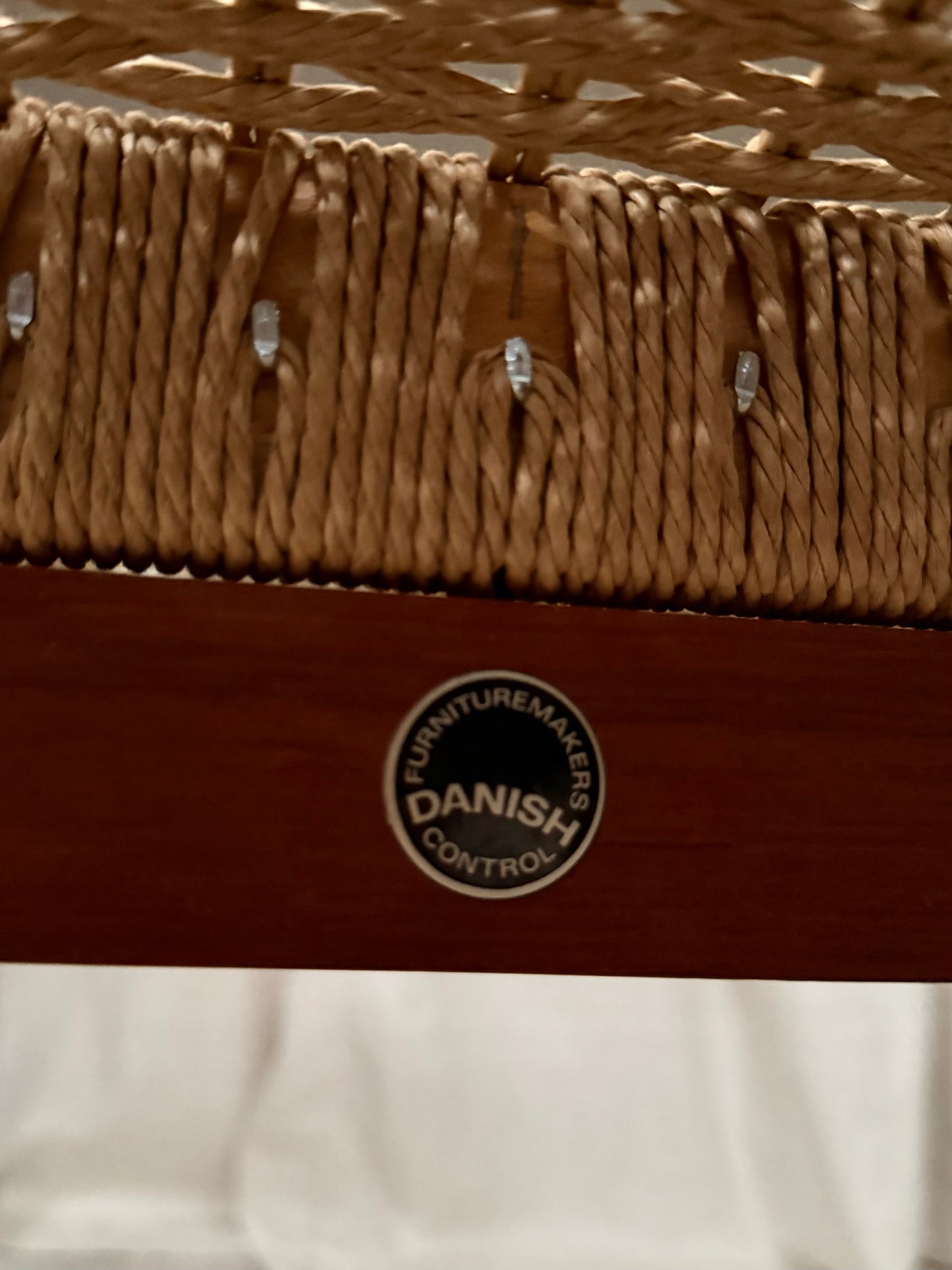 Model 63 teak and danish cord bench by Niels Otto Møller for J.L. Møller Møbelfabrik