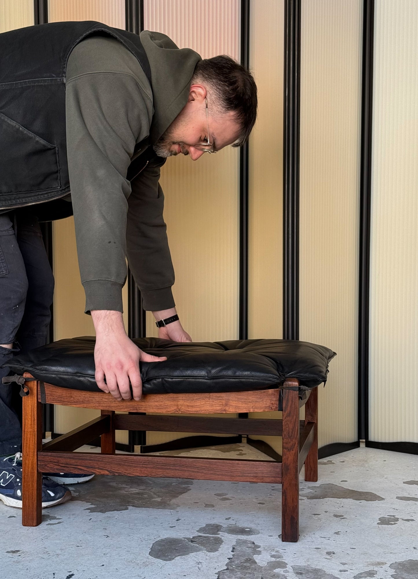 Rosewood and leather ottoman