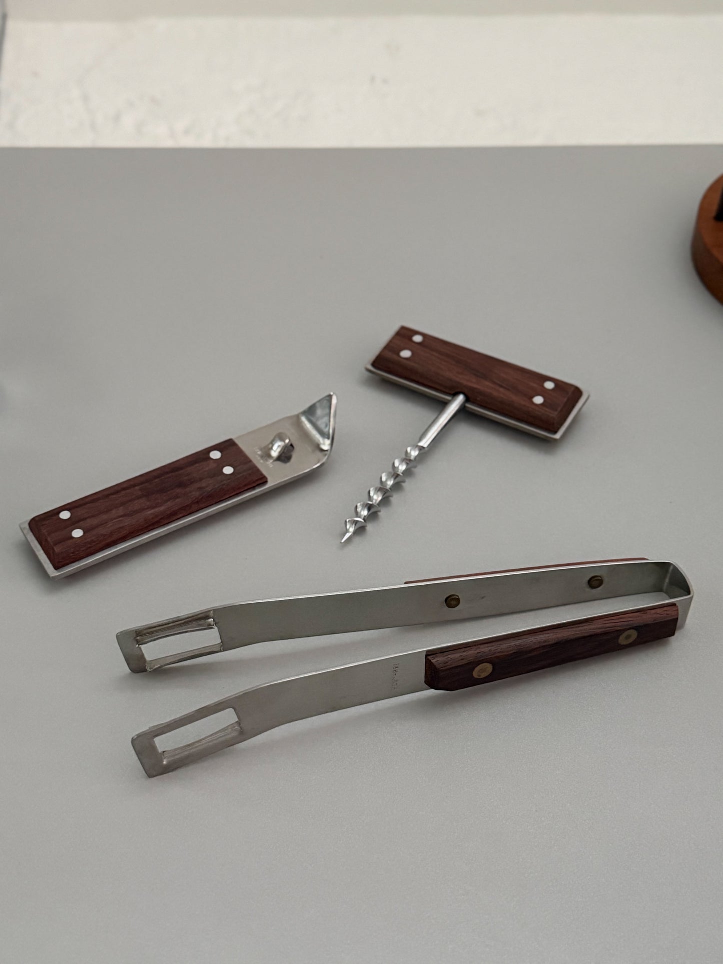 Set of rosewood and stainless bar tools