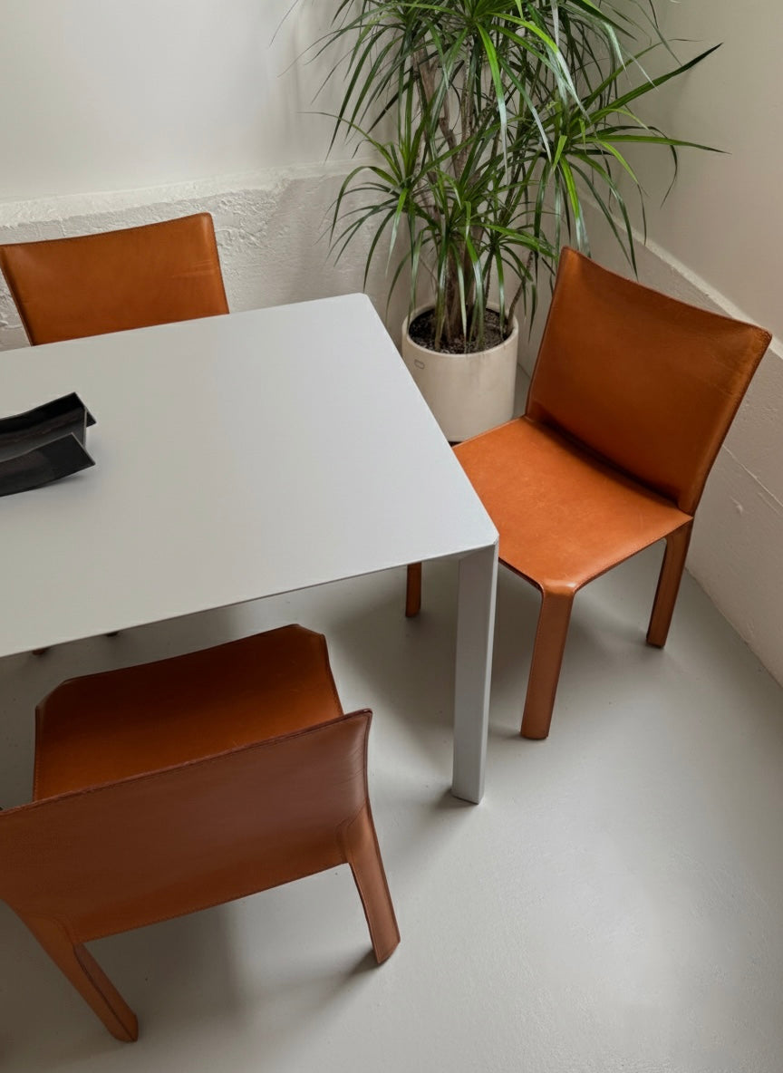 Sets of four Cab 412 chairs by Mario Bellini for Cassina