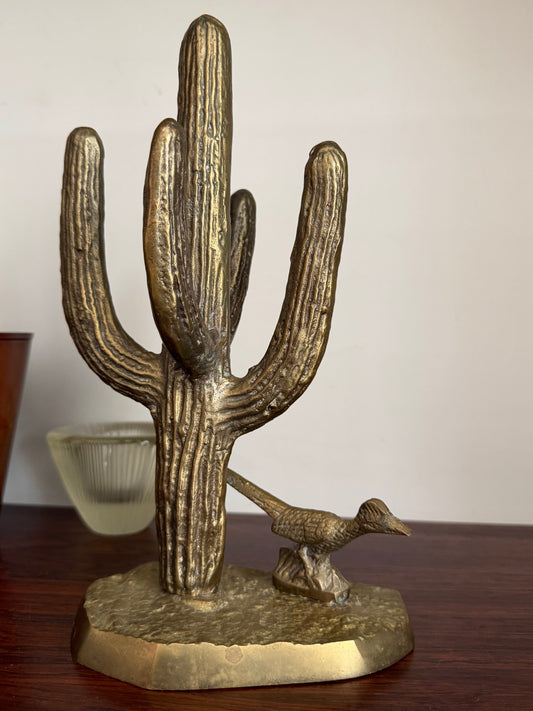 Brass roadrunner and cactus sculpture