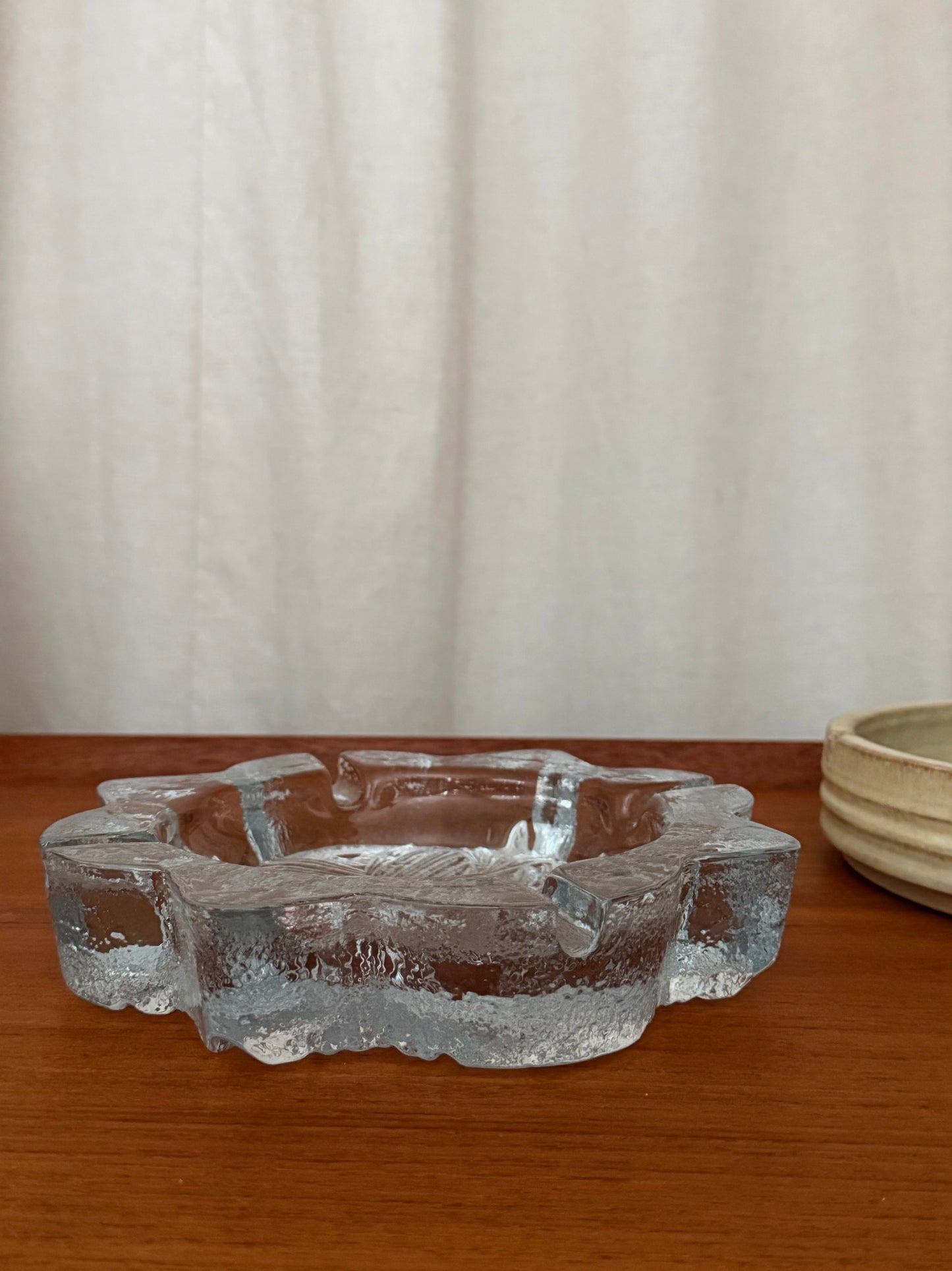 Glass snowflake ashtray by Blenko