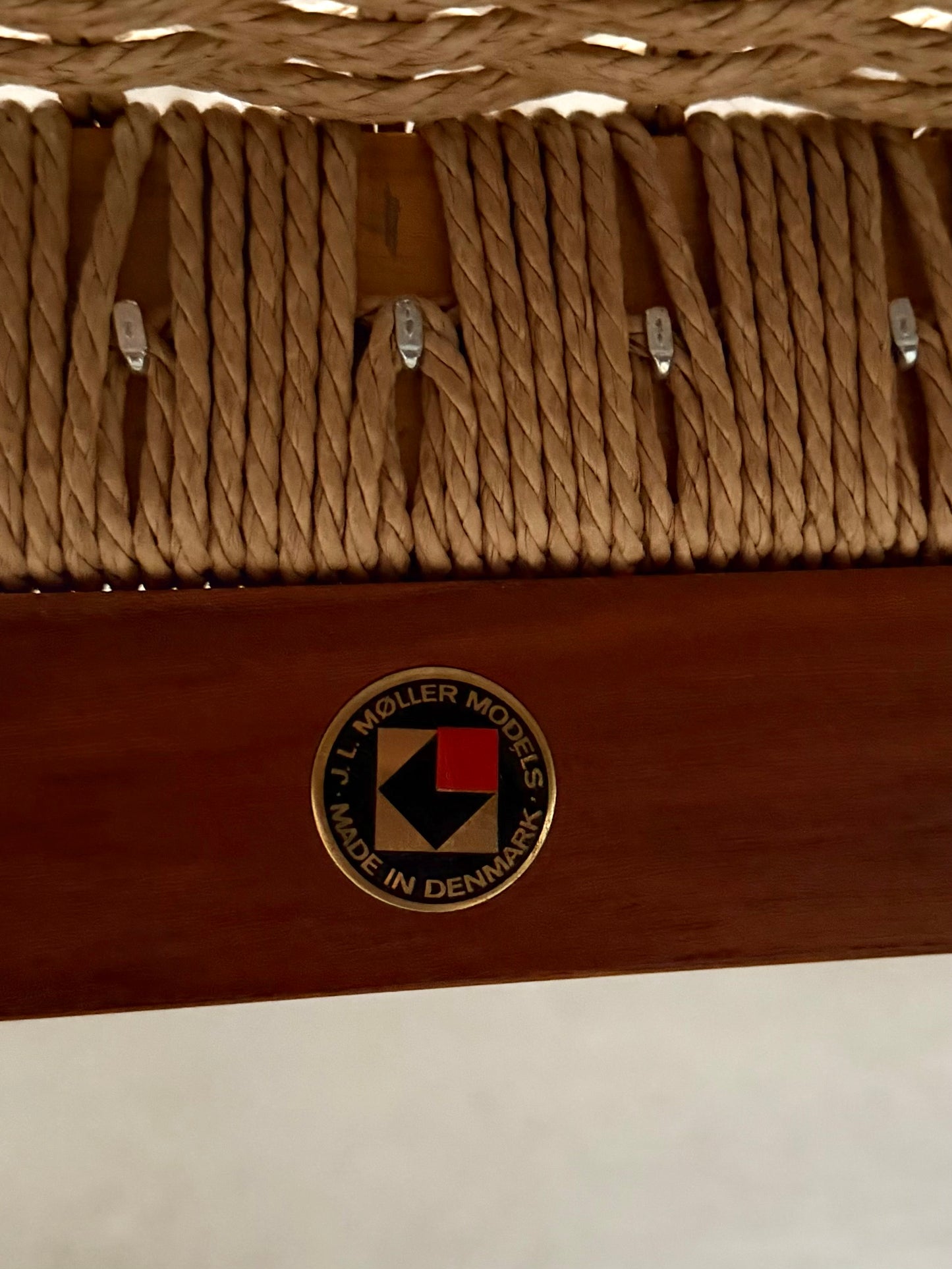 Model 63 teak and danish cord bench by Niels Otto Møller for J.L. Møller Møbelfabrik
