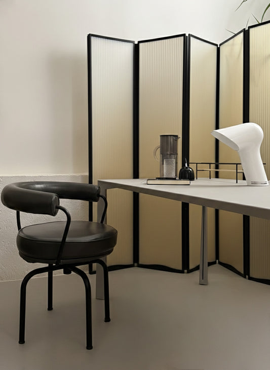 LC7 Fauteuil Tournant chairs by Charlotte Perriand for Cassina