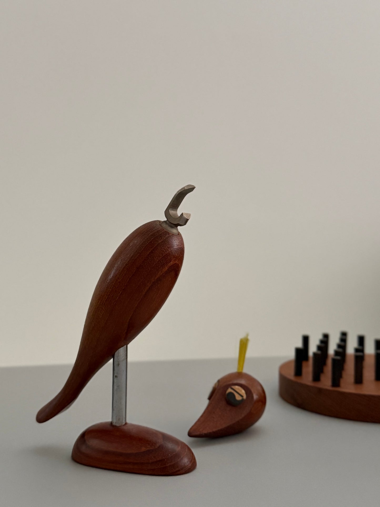 Teak bar tools in shape of a bird
