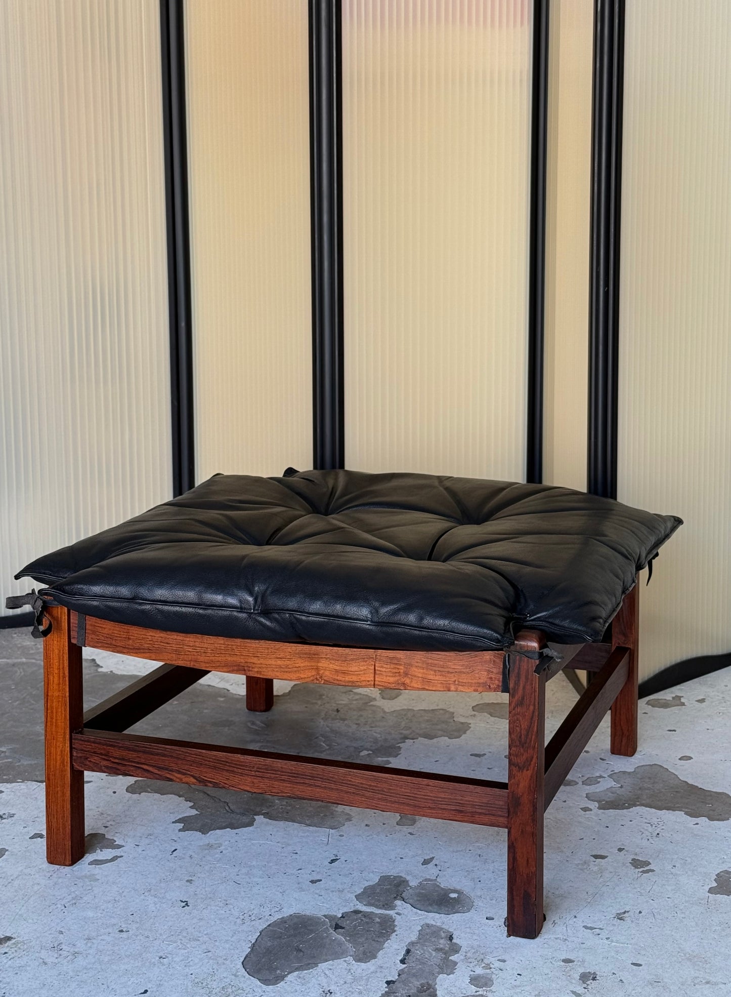 Rosewood and leather ottoman