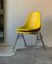 Load image into Gallery viewer, Pair of stacking chairs by Charles &amp; Ray Eames for Herman Miller
