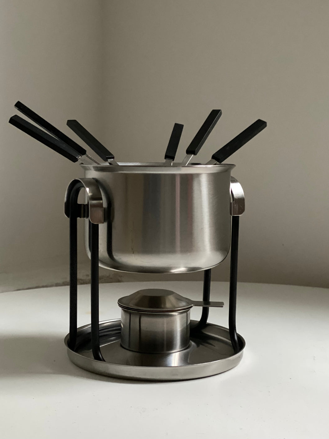Stainless steel fondue set by Erik Magnussen for Stelton
