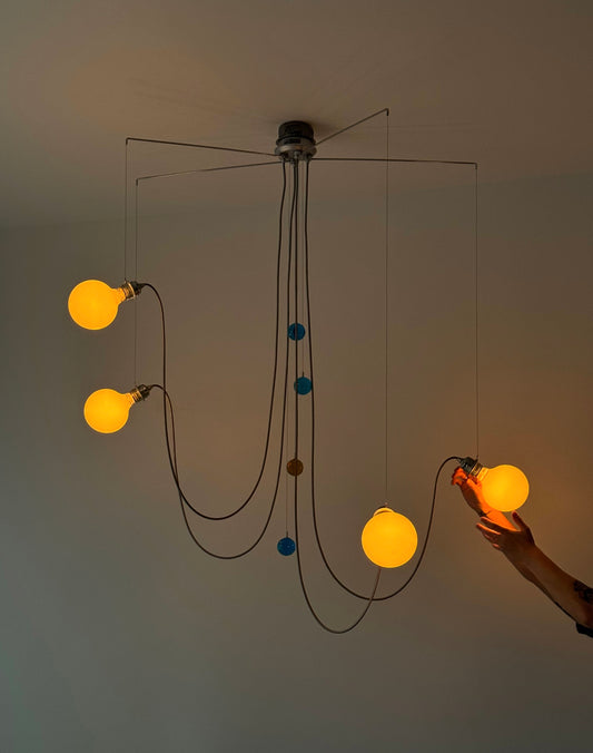 Suspension Yo-yo de H. Khademi pour Debsch Lighting